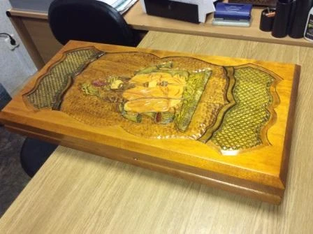 Manufacture of a set of backgammon with threads