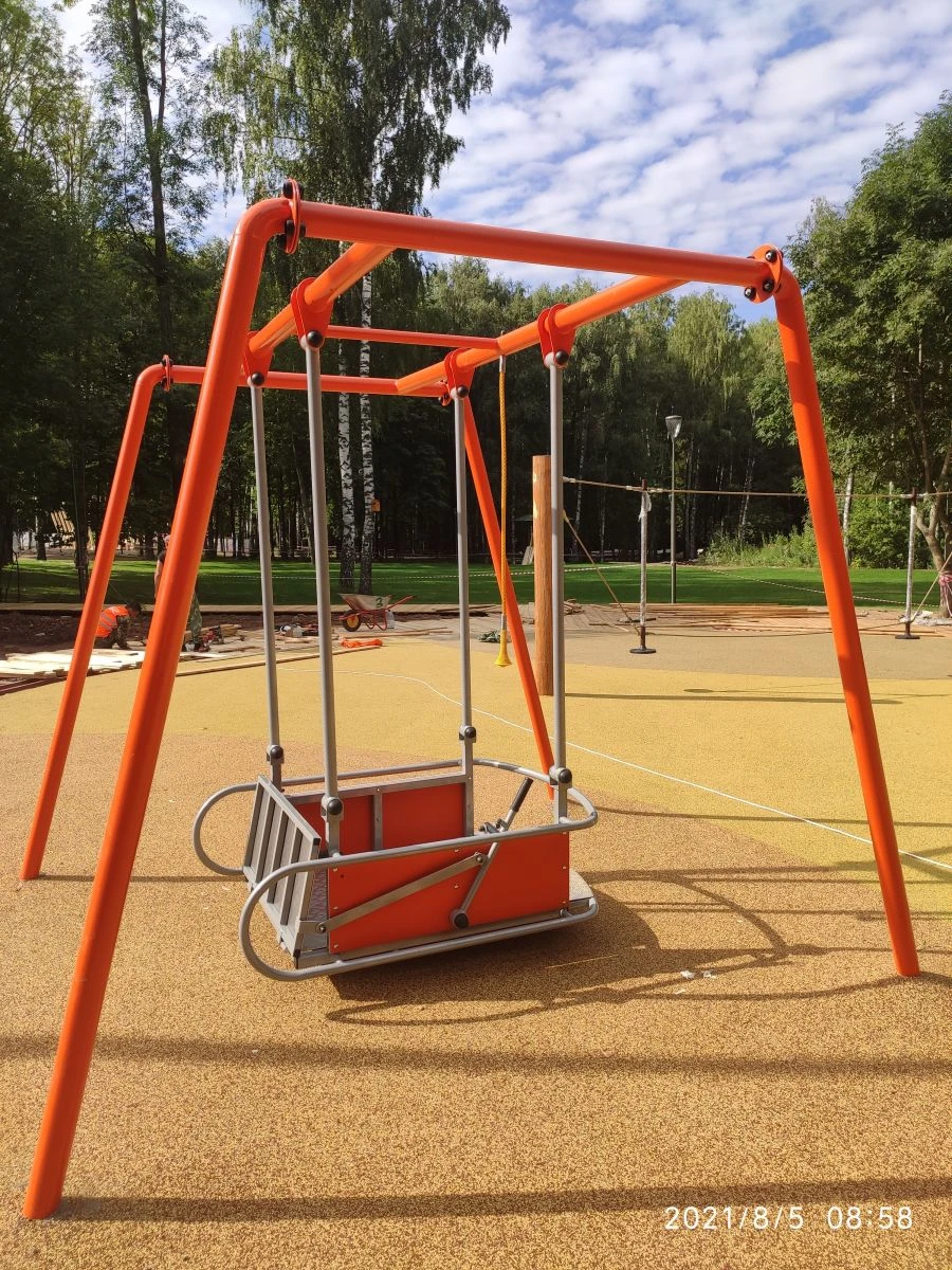 Universal wheelchair swing
