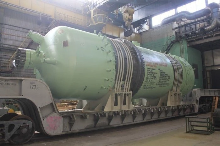 Blocks of tubular electric heaters of pressure compensator type