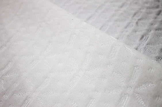 Cotton knitted fabric (cotton-100%) bleached, jacquard