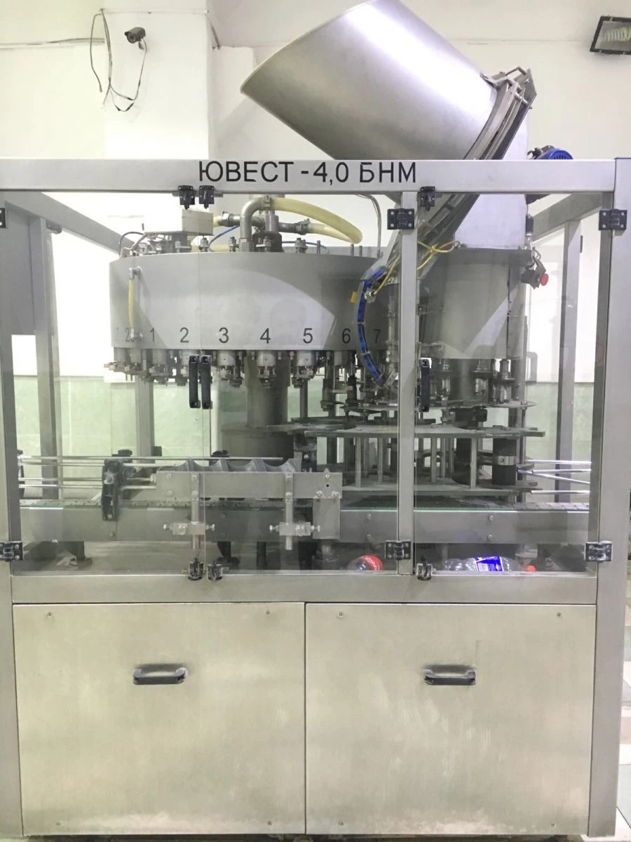 Automatic line, capacity up to 4000 bottles/hour for PET and glass containers, capacity up to 2 litres, consisting of: YUWEST-UP