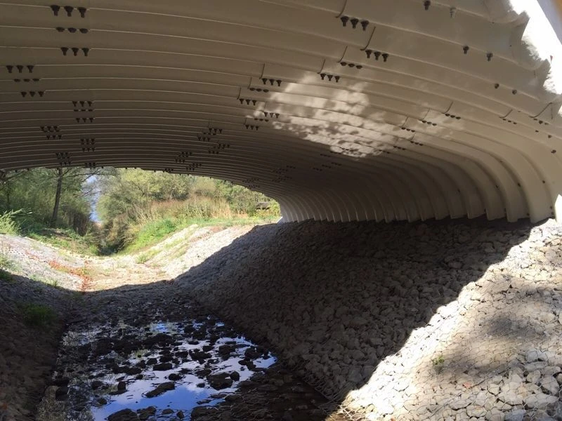 Road culvert pipes. Prefabricated metal corrugated structures with corrugation type 400x150