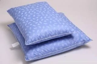 Pillow with top made of cotton fabrics with synthetic filling