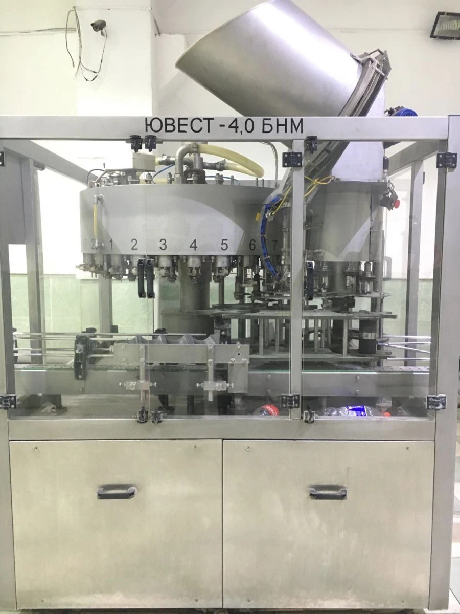 Automatic line with capacity up to 3000 bottles/hour for PET containers, capacity up to 10 litres as a part of: YUWEST-4,0 BNM-5