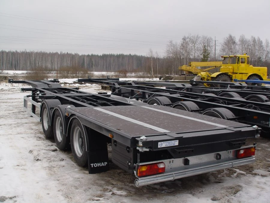 Semi-trailer-container wagon of Tonar 97462 model with axles of TONAR production models: 90422, 90424, 90431.