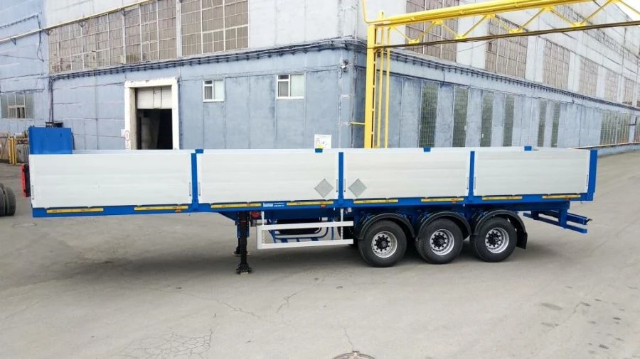Semitrailer Politrans 94171-026. In version: metal platform with decking, with boards, with cones, with modulator, on pneumatic