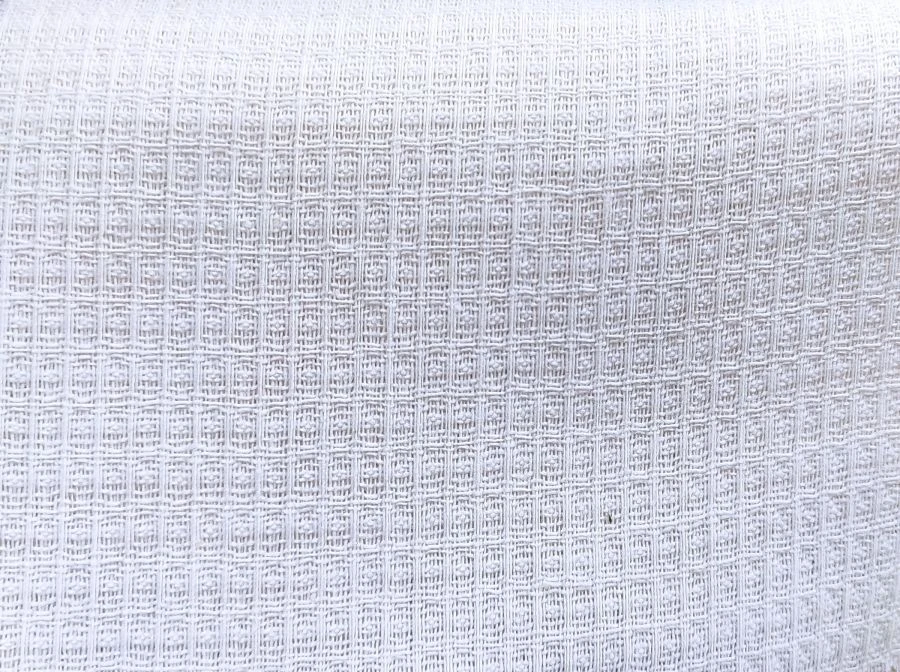 Bleached cotton waffle towelling fabric article C 42 BJU