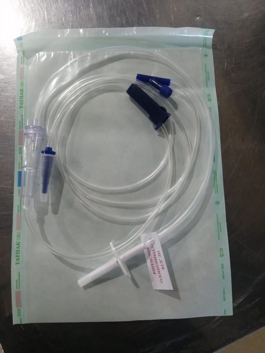 Gravity enteral feeding administration kit without a bag