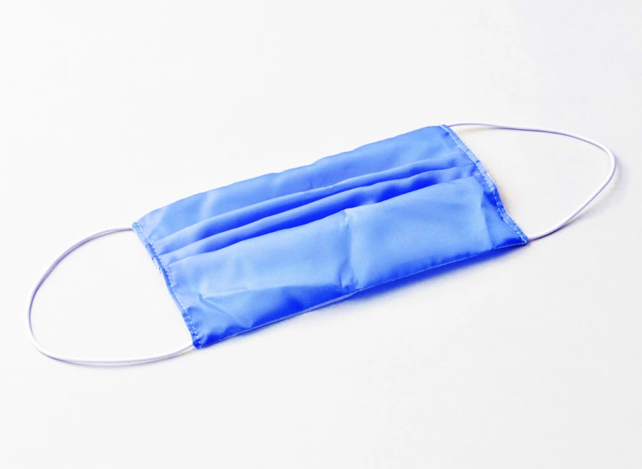 Mask with elastic bands from the set of medical isolating clothing reusable non-sterile