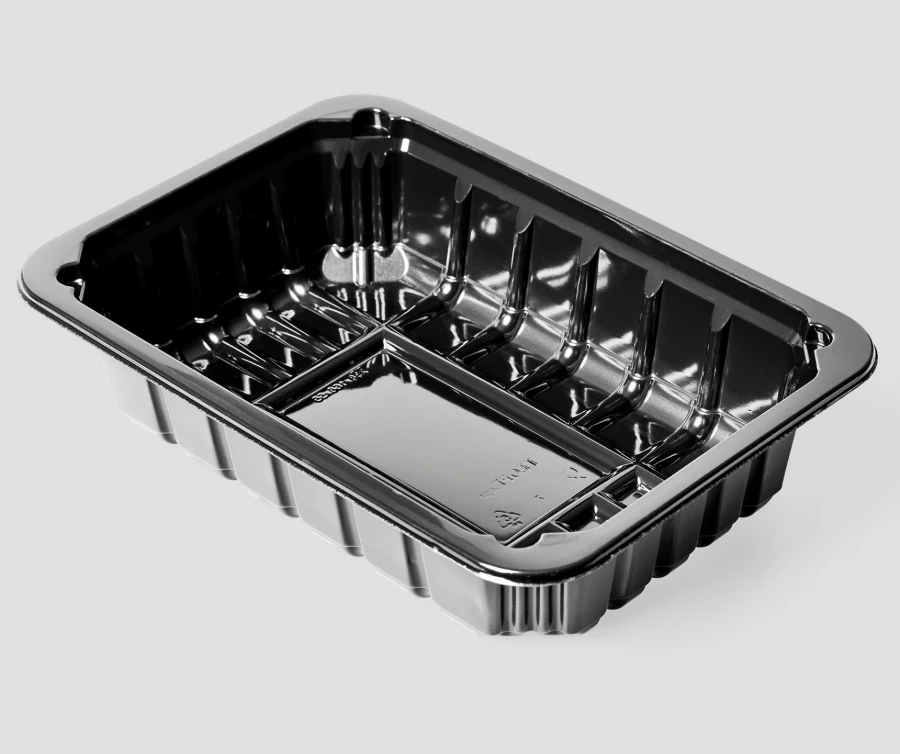 Plastics food packaging: tray with absorbent liner