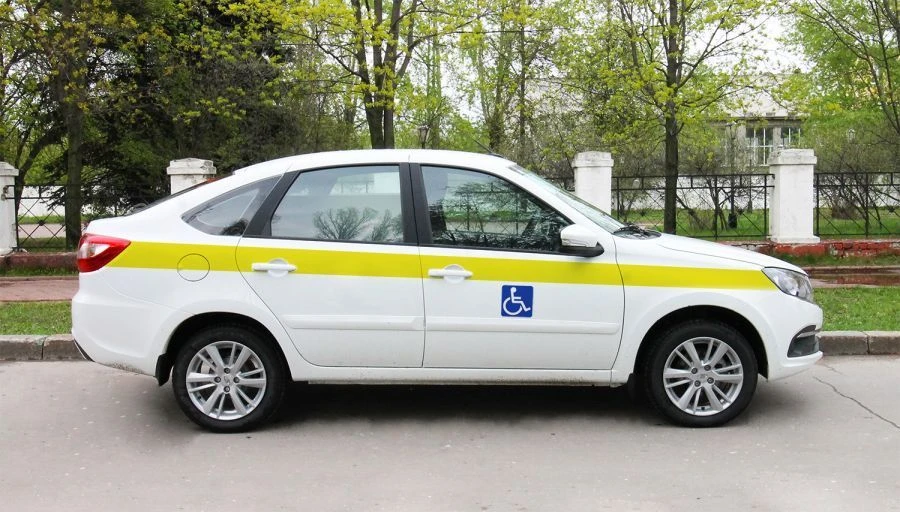 Car exclusively for transporting disabled persons, type GRNT, modification GRNT1J of category M1, on the basis of LADA vehicle t