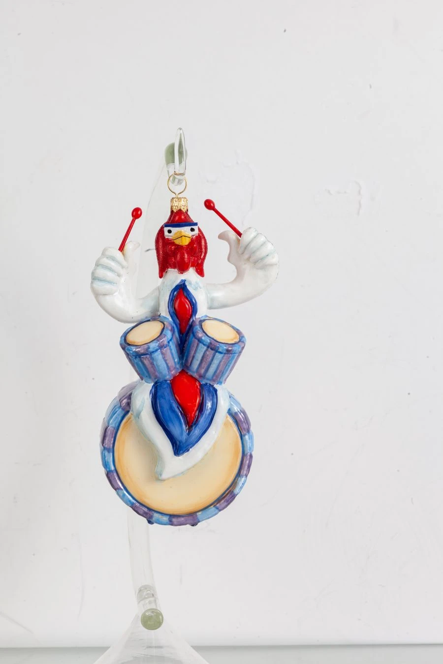 Licence Christmas tree toy made of glass "Cock on drums"