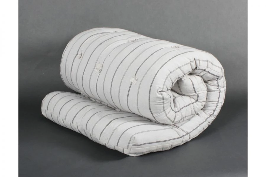 Springless mattress in a cover made of cotton fabrics with a filler Hollofiber (PE fibre) of trade mark TC "Bagira".
