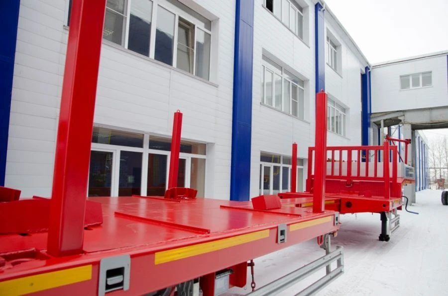 Semi-trailer heavy hauler Politrans 94184-083. In version: metal sliding platform with a loading platform, with flatbeds