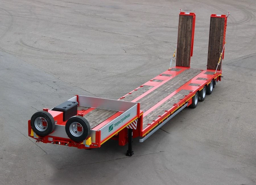 Semitrailer Tverstroimash 993931 modification 0023 variant with spring-balanced suspension and hydraulic ramps