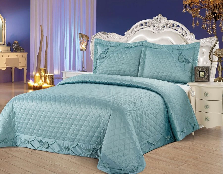 Quilted bedspreads with synthetic and mixed fillings (synthetic fibres mixed with natural fibres) with vee