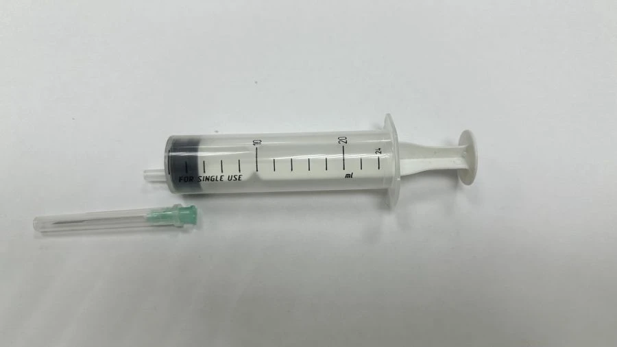 Single-use sterile three-detail "Luer" sterile injection syringe with nominal capacity of 20 ml with needle