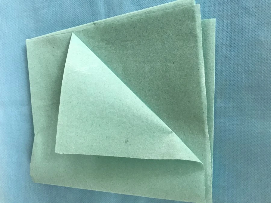 Paper-covered maternity sheet