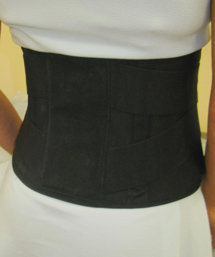 Semi-rigid fixation corset