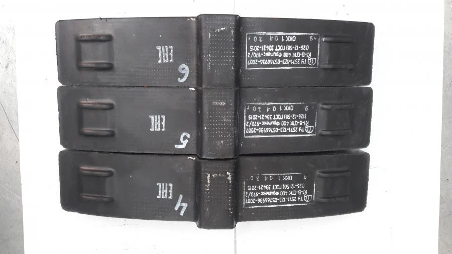 Composite composite brake pad on wire-mesh frame with cast iron insert K1-V-SPK 400 (126-12-58) made of ma