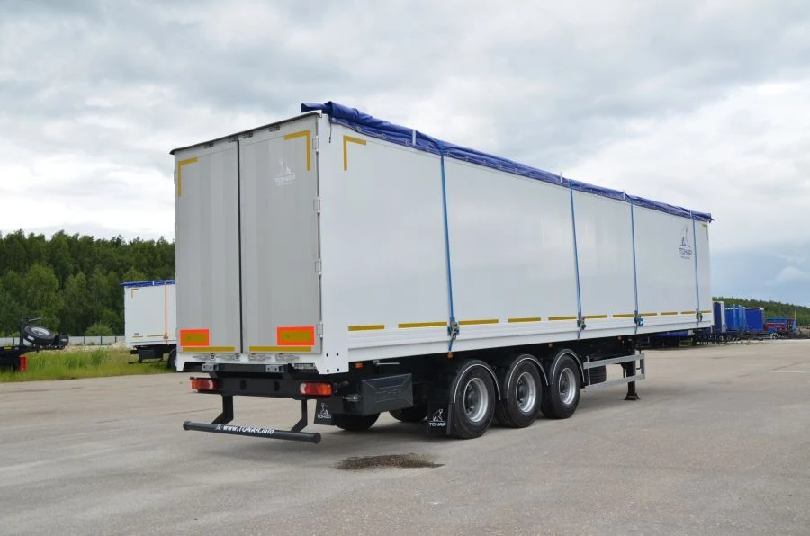 Dump semi-trailer of Tonar 9589 model with axles of TONAR models: 90422, 90424, 90431.