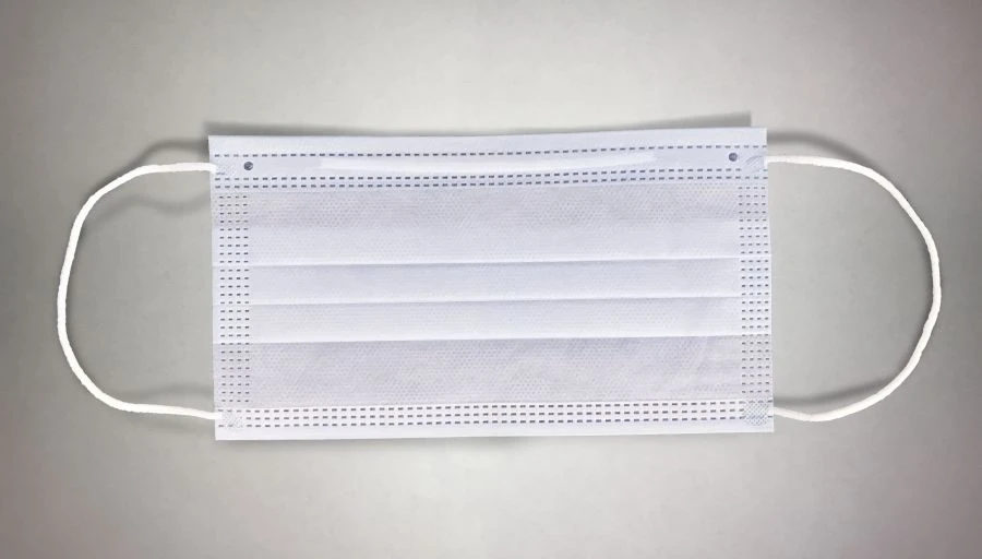 Medical disposable masks of nonwoven materials (CMC20/CMC25/CMC20) non-sterile three-layer, density 65g/m2, white