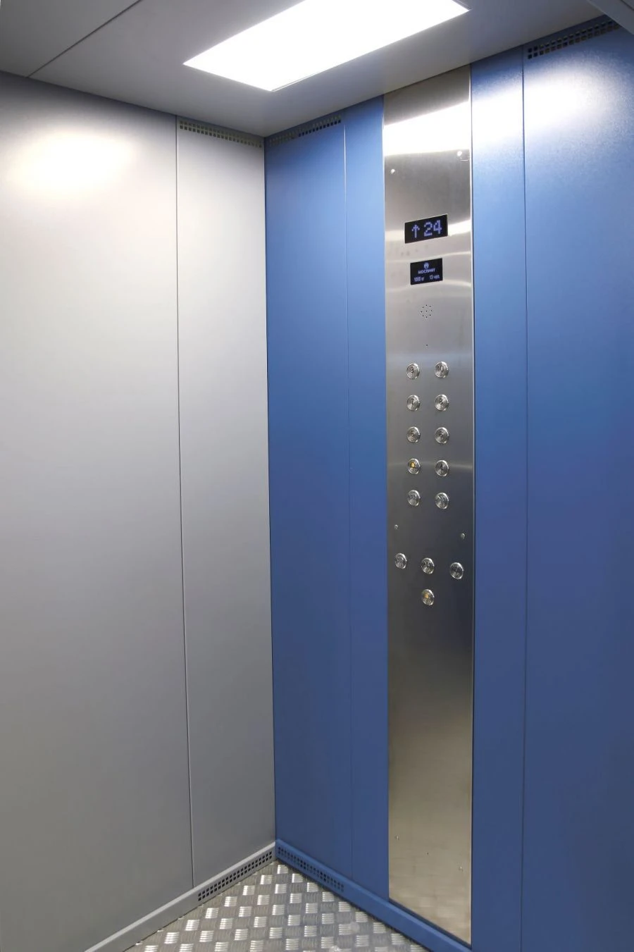 Passenger lift 1000 kg capacity, cab speed 1,6 m/s with upper machine room
