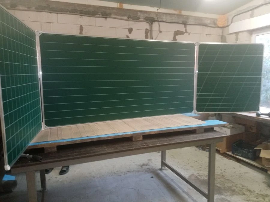 Magnetic chalkboard with rotating sections