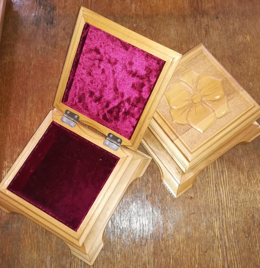 Wooden carved casket with velvet trimming
