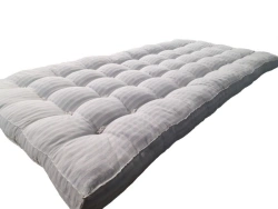 Mattresses made of cotton fabrics and filled with cotton wool.