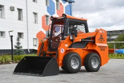 Small-size wheel loader with skid steer PMK-10-02