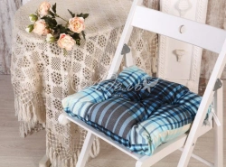 Chair cushions made of cotton fabrics, synthetic fabrics filled with polyester fibre.