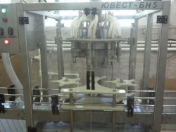 Automatic line, capacity up to 1200 bottles/hour for PET containers, capacity up to 10l, consisting of: YUVEST-BN-5;YUVEST-D;YUV