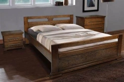 Wooden bed on legs