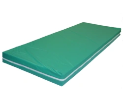 Springless mattresses with top made of waterproof fabrics and synthetic layer filling