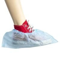 Disposable medical shoe covers low on elastic band