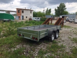 Flatbed double-axle trailer for passenger car, model 301996-02