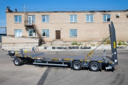 Specialised heavy haulage trailer 88523 in modifications 88523-03, 88523-04 variant with metal platform, with spikes, with pneum