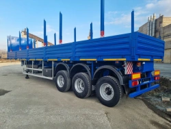Semitrailer Politrans 94171-026. In the version: metal platform with decking, with sides, with spring and pneumatic suspension.