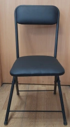 Folding chair on metal frame