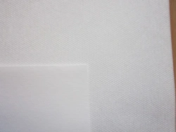 Nonwoven fabric laminated with AM and AS polymer film with surface density more than 25 g/m2 but not more than 70 g/m2