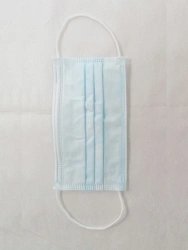 Disposable surgical mask on elastic bands