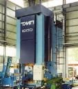Cold extrusion press for manufacturing of precision parts with minimum machining in large-sized parts.