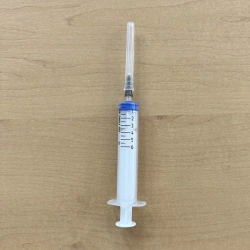 Single-use sterile three-detail "Luer" sterile injection syringe with nominal capacity of 6 ml with needle