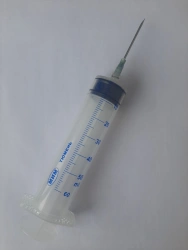 Single-use syringe, three-detail, with Luer-lock tip, nominal capacity 50 ml with 1.8x injection needle