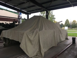 Covering tarpaulins, wagon tarpaulins, covers, canopies made of textile materials, including those for law enforcement agencies