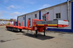 Semitrailer-heavy hauler Politrans 94184-073. In the version of metal sliding platform, with ladders, with a flatbed in the pa