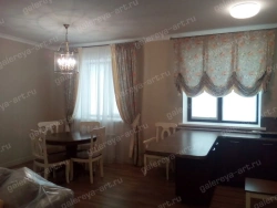 Curtain with decorative trimming