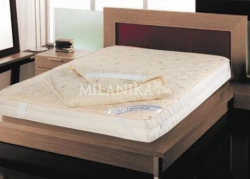 Bedding (third layer) for children under one year of age with "Milanika" trade mark (service mark) made of cotton fabrics