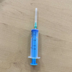 Injection syringe for single use, three-detailed, sterile type "Luer", with needle, version - 10 A "Luer" with needle, in versio